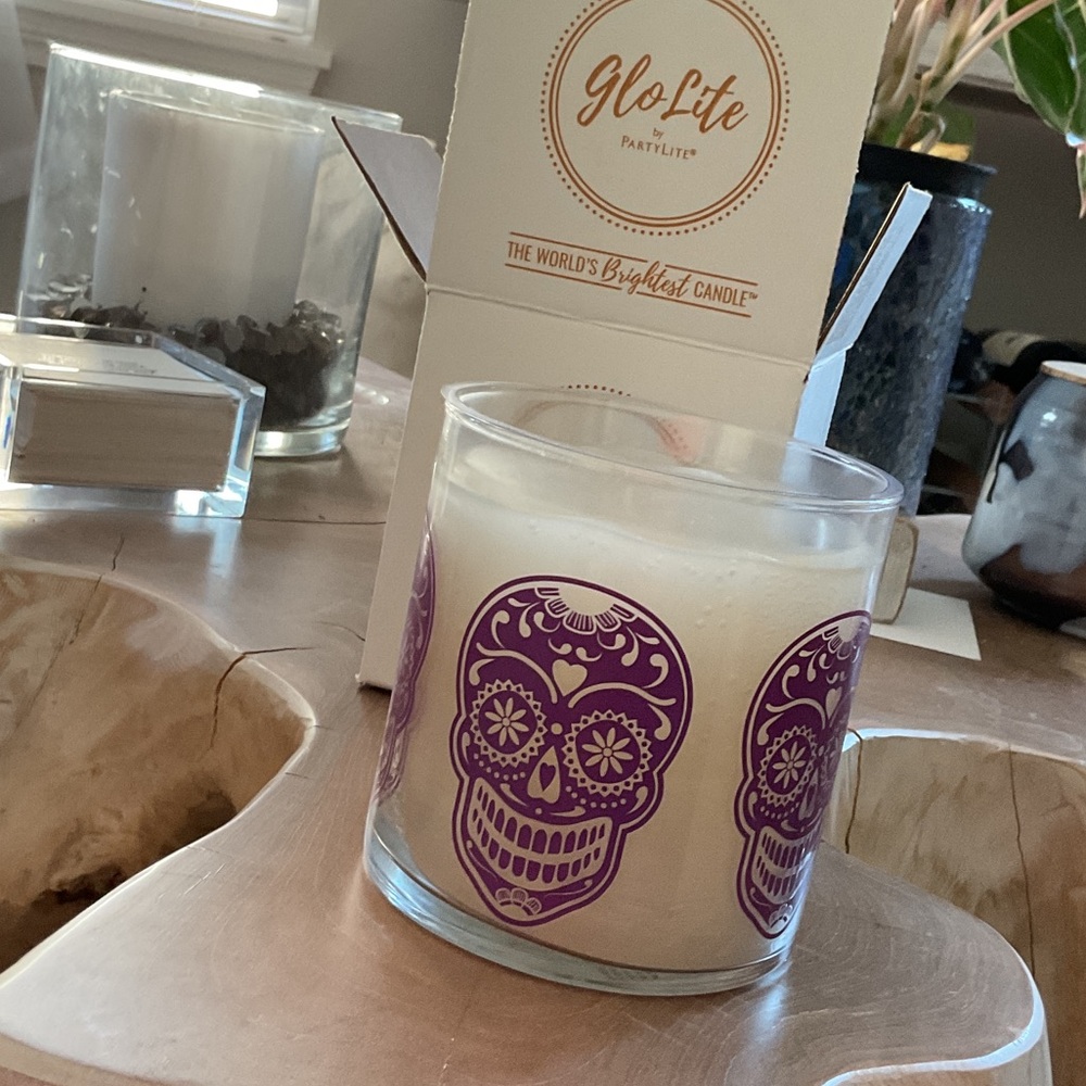 PartyLite GloLite Candle with Purple Skull Design